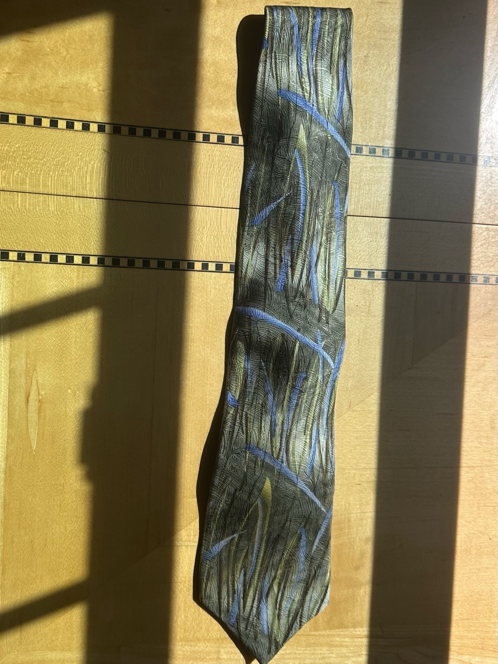 J. Garcia Black Tie with Blue Brushstroke Pattern